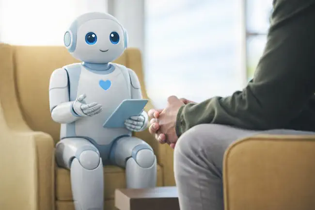 Vriendelijke AI-robot als therapeut in gesprek met cliënt, symbool voor AI als therapeut versus menselijke therapie bij Jouw Eigen Veerkracht